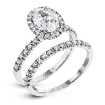 OVAL-CUT HALO ENGAGEMENT RING & MATCHING WEDDING BAND IN PLATINUM WITH DIAMONDS