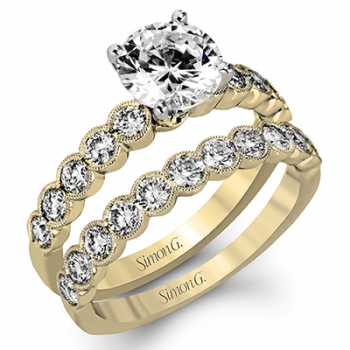 ROUND-CUT ENGAGEMENT RING & MATCHING WEDDING BAND IN 18K GOLD WITH DIAMONDS